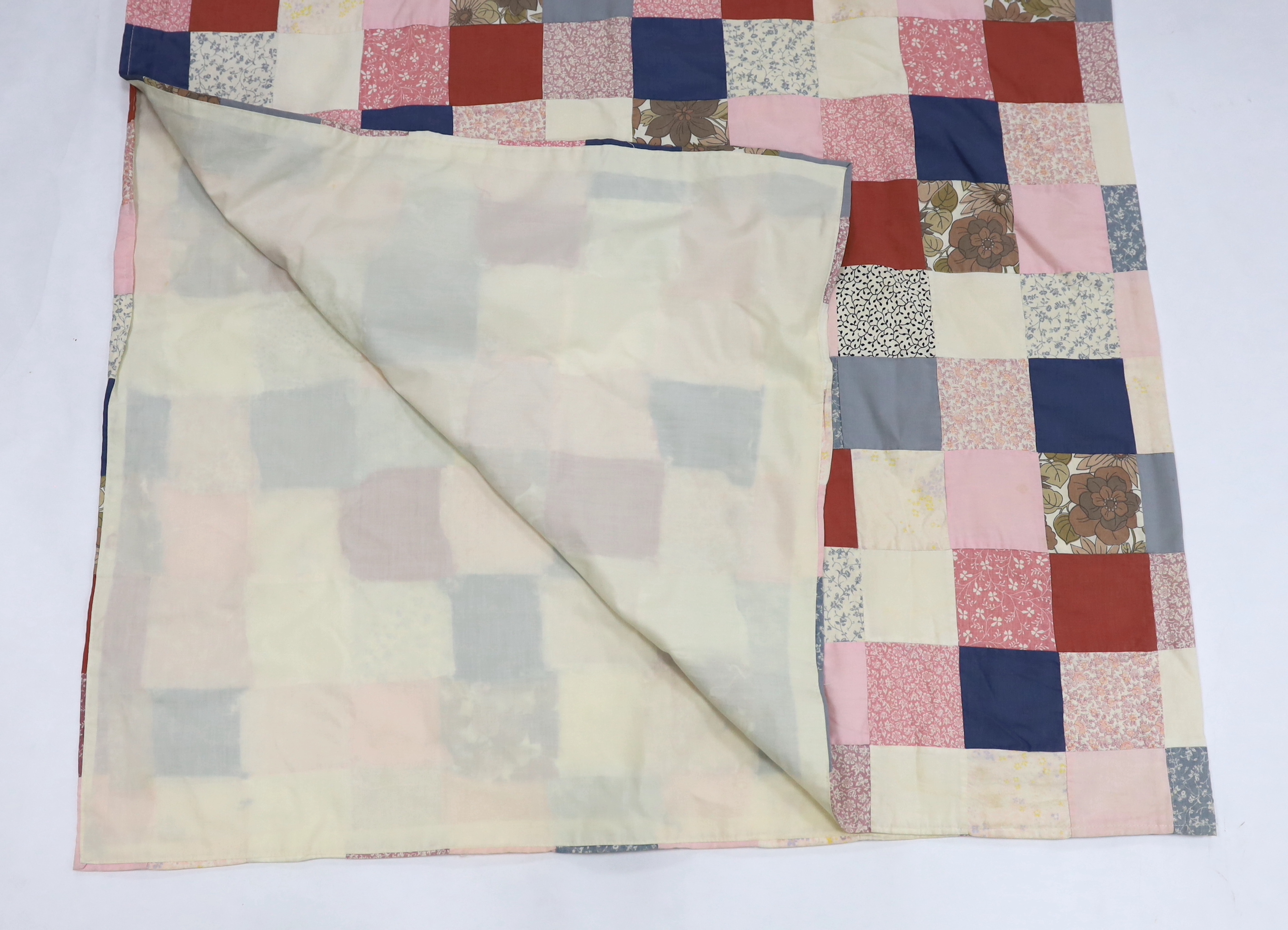 A patchwork bedcover, designed with Laura Ashley, 20th century fabrics, 215cm x 215cm sq.